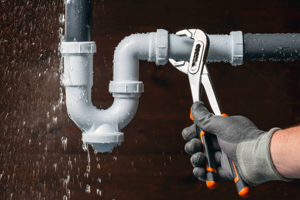 Professional Emergency Plumber technician working in Hartselle, AL